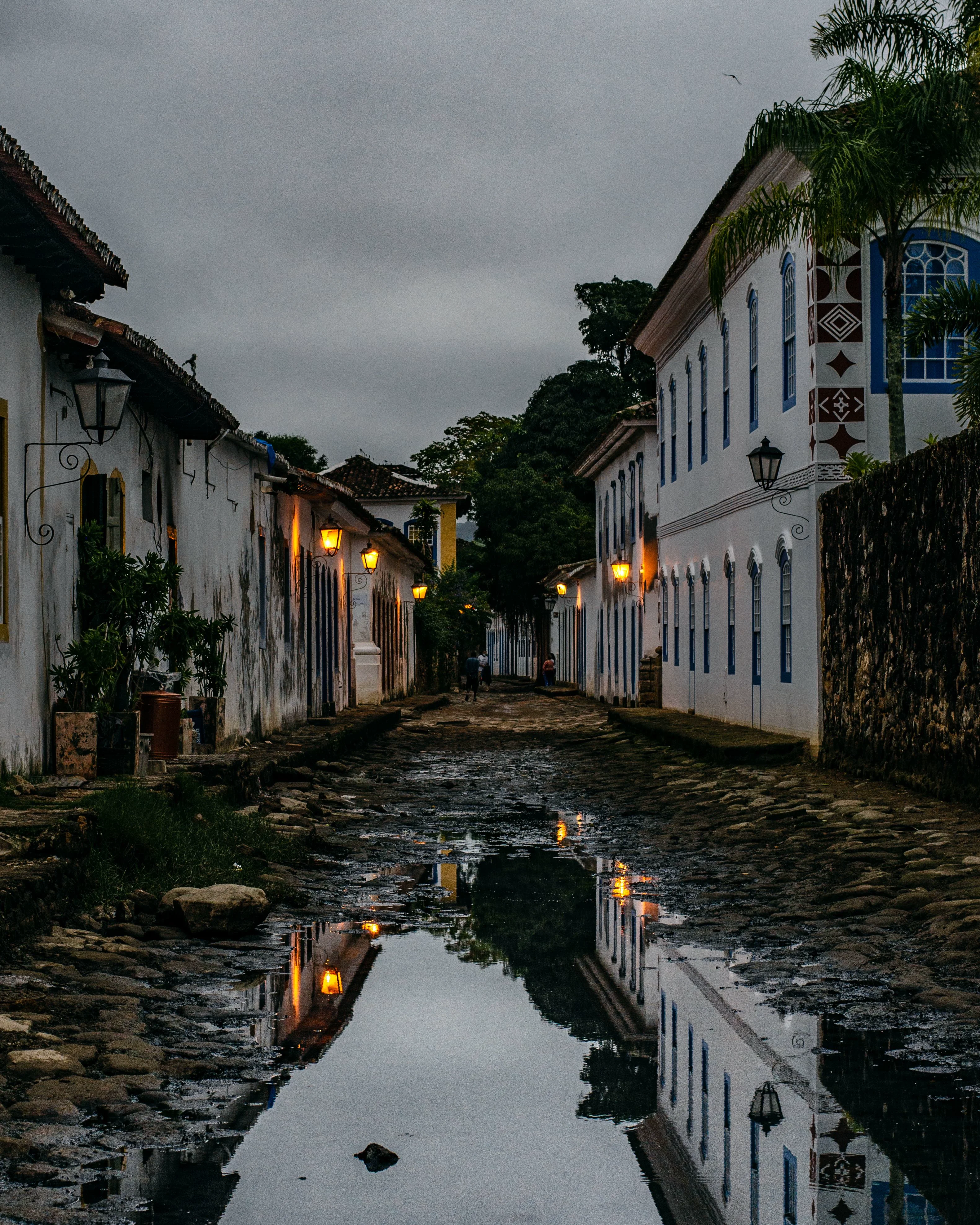 Paraty offers colonial streets and restaurants; Ilha Grande offers car-free trails and beaches.